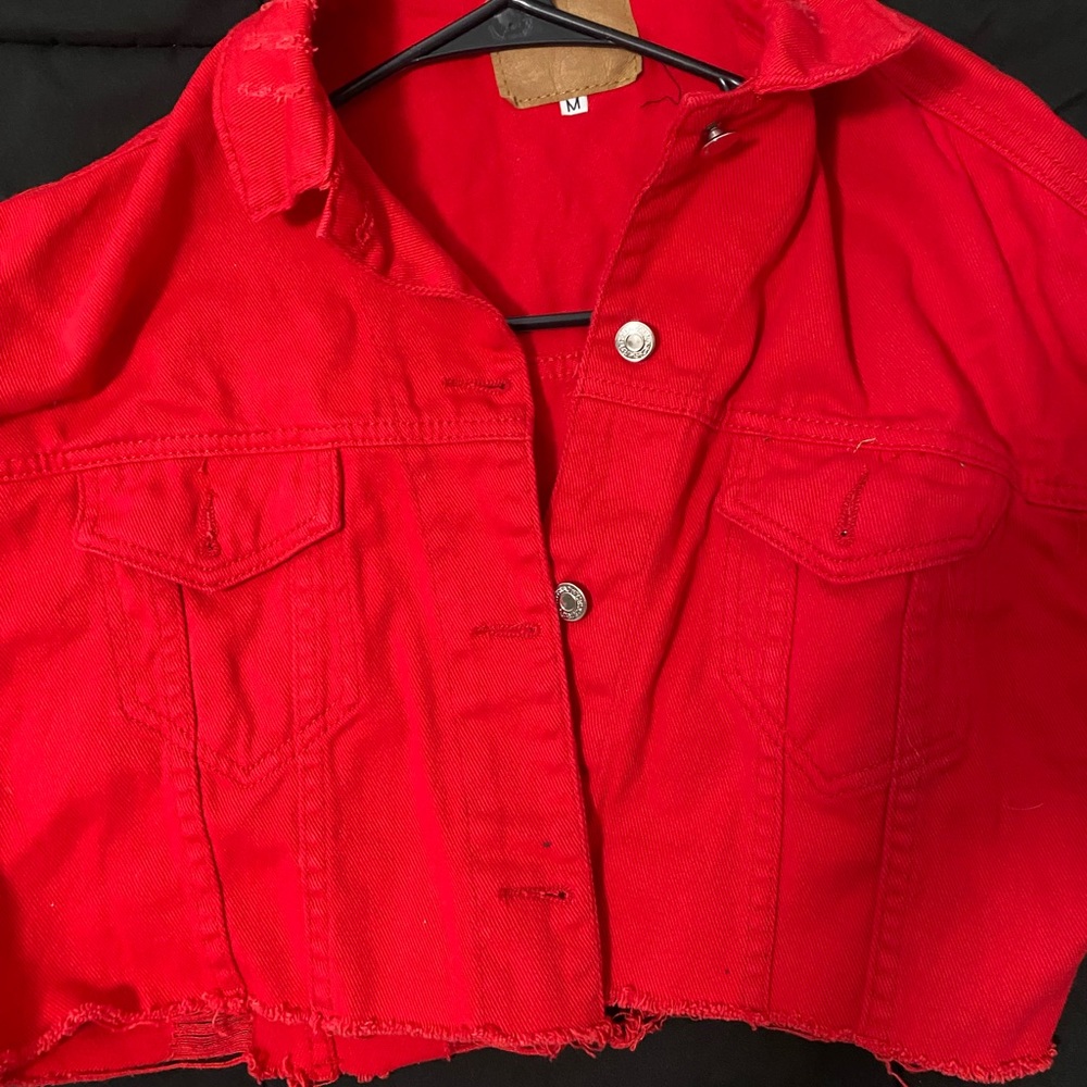 Red distressed jean jacket